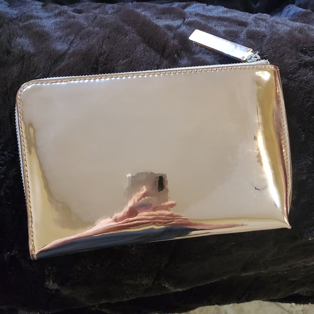 Banana Republic Rose Gold phone charger clutch